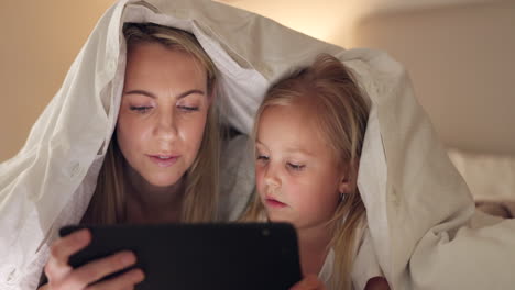 Tablet,-mother-and-girl-with-bedroom-blanket-fort