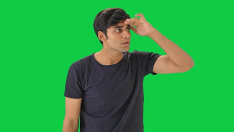 Indian-boy-finding-someone--Green-screen