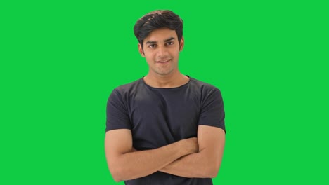 Happy-Indian-man-standing-crossed-hands--Green-screen