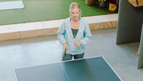 Winner,-sports-and-woman-winning-a-table-tennis