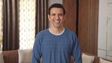 Portrait-of-happy-Indian-man-smiling