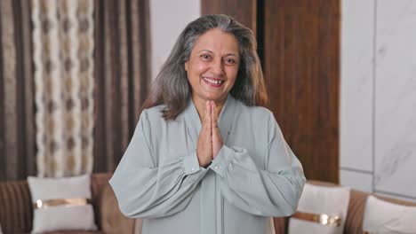 Indian-mother-doing-Namaste-and-greetings