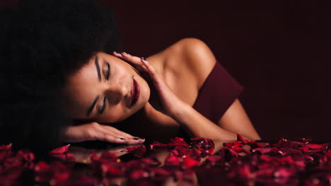 Sexy,-seductive-and-black-woman-in-petals