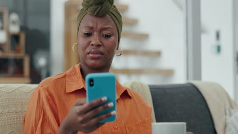 Black-woman,-smartphone-or-confused-on-living-room