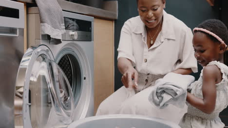 Mom,-child-smile-and-teaching-laundry-together