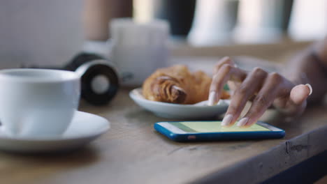 Phone,-social-media-and-coffee-shop-with-the-hand