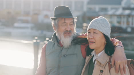 Senior-asian-couple,-pointing