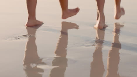 Couple-feet,-walking-and-beach-sand-steps