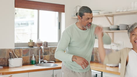 Dance,-cooking-and-senior-couple-in-the-kitchen