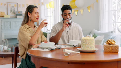 Happy,-birthday-and-toast-with-couple-at-table