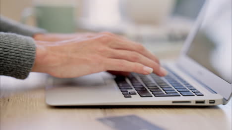 Woman-hands-typing-laptop-keyboard