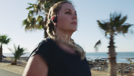 Plus-size-woman-running-on-beach