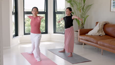 Yoga,-stretching-and-teacher-woman-with-client
