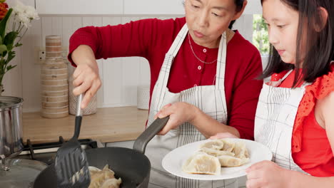 Family,-children-and-cooking-dumplings