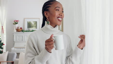 Black-woman,-coffee-and-looking-out-window-at-home