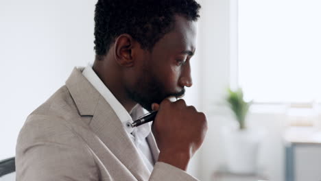 Black-man,-thinking-and-working-on-company-report