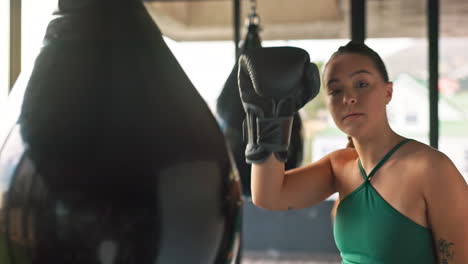 Tired,-boxing-and-portrait-of-woman-in-gym