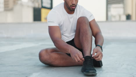 Fitness,-man-and-shoes-in-preparation-for-sports