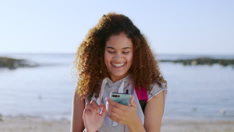 Woman,-phone-and-happy-smile-at-beach
