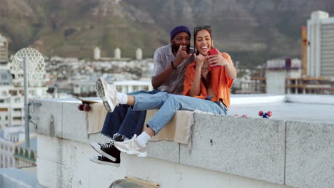 Selfie,-rooftop-and-couple-with-skateboard