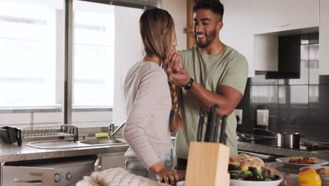 Food,-couple-and-cooking-in-a-kitchen-by-man