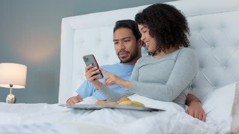 Smartphone,-laugh-and-couple-in-bed-to-relax