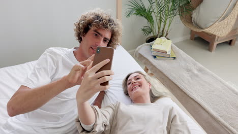 Bedroom,-phone-or-couple-of-friends-on-social