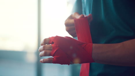 Hands,-fighter-and-bandage-wrapping-fist