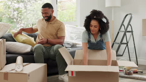 Black-couple,-moving-out-and-tape-box