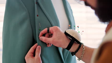 Fashion-designer,-hands-and-pin-clothes