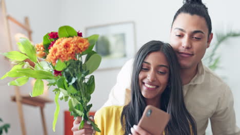 Couple,-flower-bouquet-or-phone-in-home-living