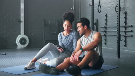 Smartphone,-fitness-and-personal-trainer-talking