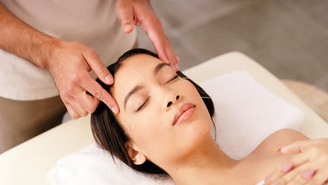 Woman,-relax-and-facial-acupuncture-in-skincare