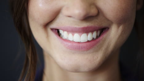 Face,-smile-and-teeth-with-woman-and-dental-zoom