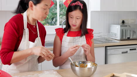 Grandmother,-child-and-cooking-chinese-food