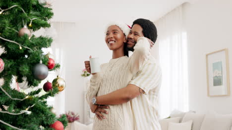 Christmas,-hug-and-couple-with-coffee