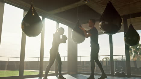 Sports,-boxing-and-woman-training-with-coach