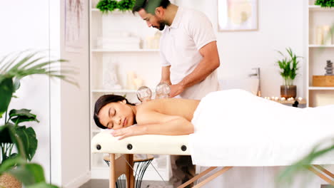 Woman-in-luxury-spa,-cupping-massage-by-physical