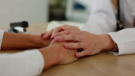Holding-hands,-support-and-patient-consulting