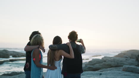 Phone,-friends-and-selfie-at-beach-for-sunset