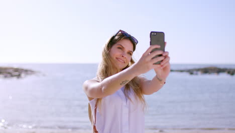 Woman,-beach-and-selfie-with-phone-for-travel