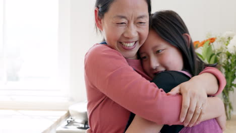 Happy,-love-and-Asian-mother-hugging-her-child