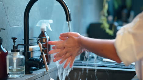 Woman,-washing-hands-or-hygiene-cleaning-in-home