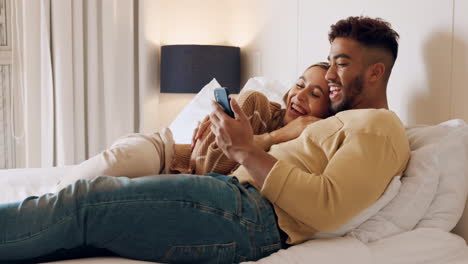 Phone,-social-media-and-love-with-a-couple-in-bed