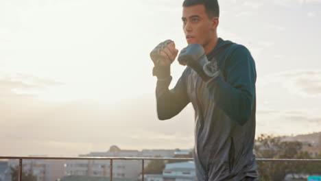 Man-boxing-outdoor,-fitness