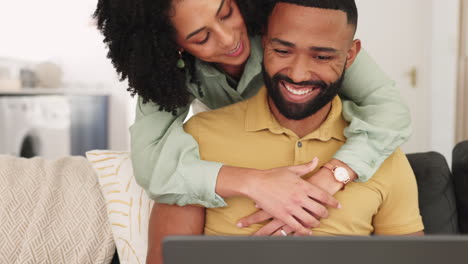 Love,-hug-and-black-couple-with-laptop-on-sofa