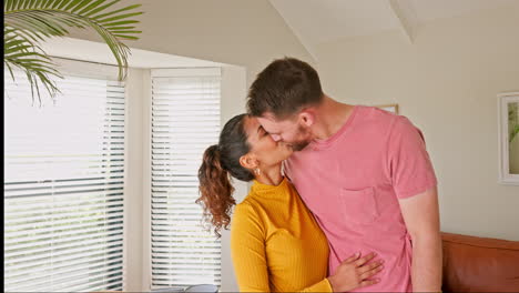 Couple,-moving-and-man-kissing-woman