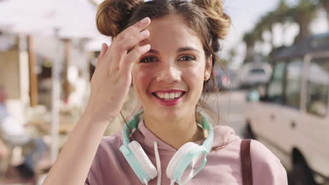 Face,-smile-and-woman-with-headphones-in-city