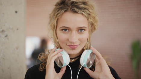 Woman,-face-and-headphones-for-music-whlle-dancing