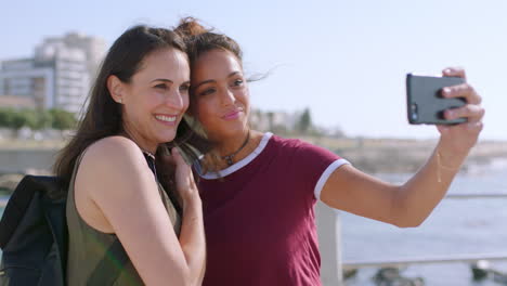 Selfie,-travel-or-women-friends-with-phone